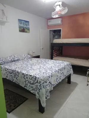 Room in Guest Room - Green Sea Inn in the San Luis Sector Hotels in San Luis