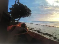 Relax and rejuvenate in South Coast of Kenya: Beach front property sleeps 6 , Hotel a Msambweni