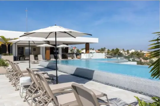 ACROSS THE STREET FROM OCEAN! Stunning Condo with Private Pool/patio