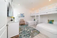 7 Mile Beach views from the Roof terrace. Luxury Condo with Private Beach Club