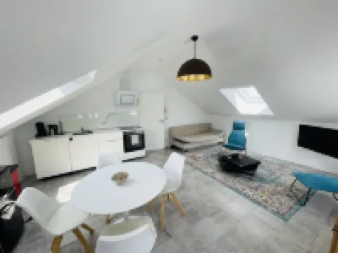 Bright, spacious attic apartment.