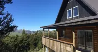 Scandinavian look log cabin with fantastic views over the mountains