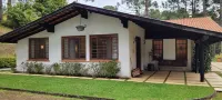 Cozy house on Lake Bambuí in Campos do Jordão