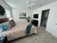 Palms & Putters is a brand new home in the awesome Village of Richmond!