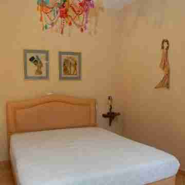 Elegant villa with private beach, pool, barbecue, sauna, jacuzzi and herb garden Rooms