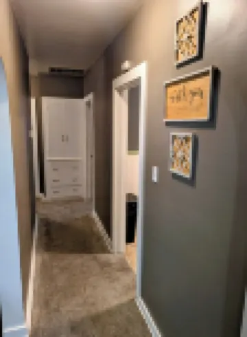 Cozy two-bedroom house with central heat and air. Close to downtown Ark City. 阿肯色城酒店