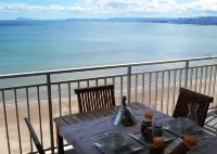 APARTMENT DESIGN 1 LINE BEACH WITH SWIMMING POOL, TENNIS COURT AND GARAGE. Hotels in Cullera