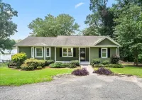 Experience Serenity on Broadway Lake in this beautiful 3 bedroom home - 4-Star
