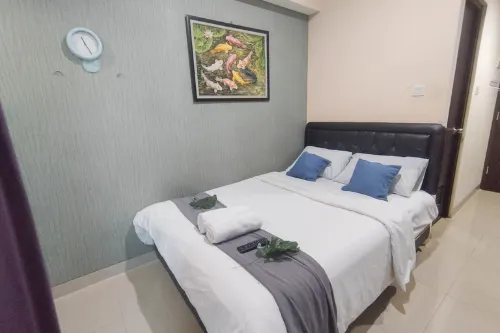 Minimalist Studio (No Kitchen) at Tamansari Papilio Apartment By Travelio