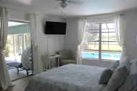 Marco Island Pool Home: Lake and Sunset Views, 2 Bedrooms, 2 Bath . Pet Friendly