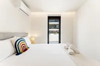 GuestReady - Beachfront retreat with pools - balcony