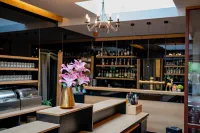 Maxmilian Lifestyle Resort - bar