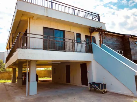 Kamakura Seaview Guesthouse Sun & Breeze Отели рядом с достопримечательностью «Sasuke Inari Shrine»