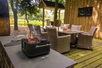 Woodland Cabin with Private Lake, Sauna + Fire Pit