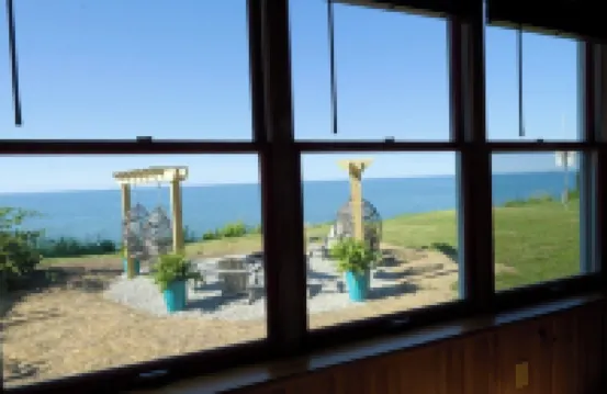 Luxury Lakefront Retreat: Panoramic Views, Game Room, Fire Pit Swings & More