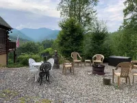 Long Range Mountain Views with Hot Tub and outdoor camp fire ring!