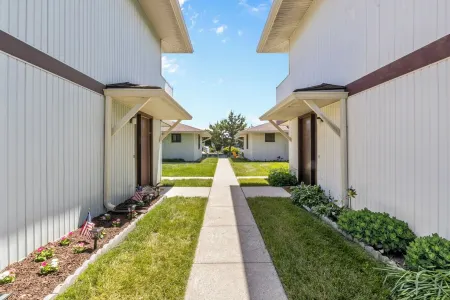 REMODELED - 2 Bedrm 2 Bath Bayside Townhome on Canal with Pool across from Mall