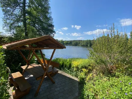 Holiday apartment "Seewohnung" in a holiday home - directly on the lake Отели в г. Даме-Шпревальд