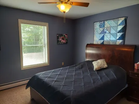 NEW for 2024, 6 person hot tub. Spacious country home with large back yard.