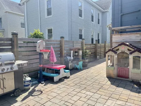 The Lemonade Stand on Plum with Backyard Bar