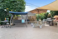 Swim with Butterflies! Garden, Heated Pool 1mi to Beach 4 Bed 3 Bath Sleeps 10