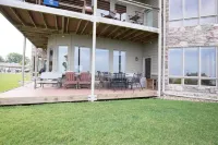 Prime Lakefront East Okoboji Condo at Bridges Bay Jet Ski Lift rental available!