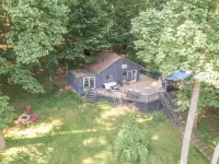 Pool, sauna, large 2000sf deck, tennis court, a private trail, 15.5 acres
