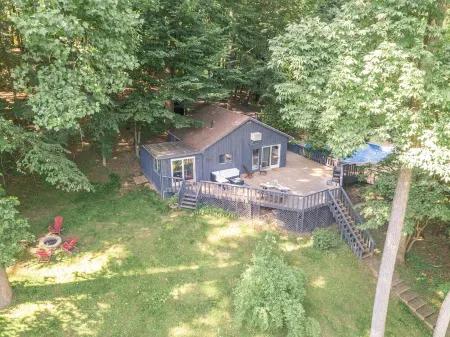 Pool, sauna, large 2000sf deck, tennis court, a private trail, 15.5 acres