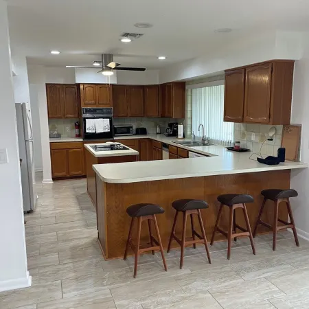 beautiful home on a 3 acre lake with security