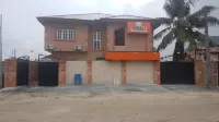 Momak 6 Hotel & Suites Hotels near RCCG The Messiah's Place