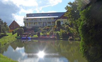 Roomy Apartment in Lichtenhain with Pond