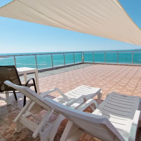 Beachfront Apartments by Marty's