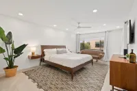 Spacious Two-Story Retreat with Garden Views - Stylish Coastal Haven