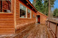 Hot Tub and Spacious Deck Amidst Pines - Stylish Tranquil Retreat