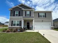 5 bedroom spacious home, with charcoal grill and seating. Peaceful neighborhood.