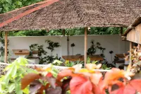 Guindulman Bay Tourist Inn Hotels near RAJ Shopping Center