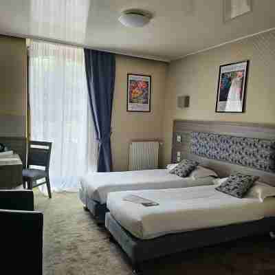Cit'Hotel Hôtel Le Challonge Rooms