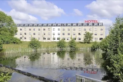 Hotel Quickborn & Gästehaus Hesse Отели рядом с достопримечательностью «Торфбан Химмельмор»