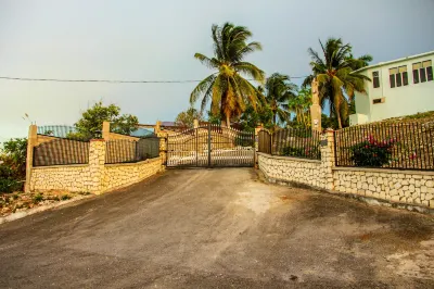 Sunshine Lodge: Your Home Away from Home Hotels near Red Stripe Beach