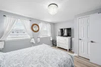 Spacious, recently renovated centrally located condo with pool and parking