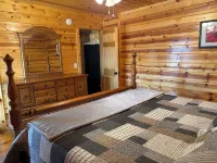 Six bedroom home with a hot tub, pool and an outdoor bar on a two acre lot.