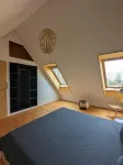 Modern wooden house on the Bodden with two apartments that can be combined