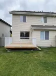 Entire Home in Edmonton South close to Airport with fenced private yard & deck
