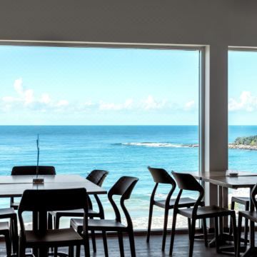 Ocean view dining area at accommodation near Yamba Beach in New South Wales