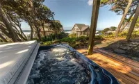 Cloud Nine - A Charming Ocean View Home with Hot Tub & Fire Pit in Belle Beach!