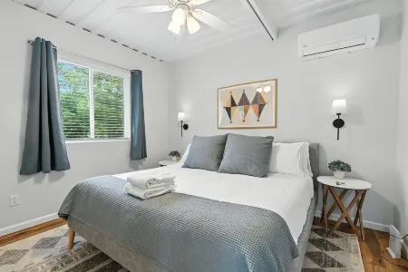 Cozy Getaway with Fire Pit and Charcoal Grill - Rustic Modern Retreat