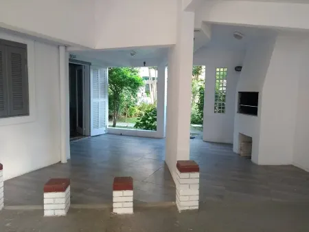 Beach house in gated community w / pool in Capão Novo Отели в г. Capao da Canoa