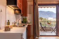 Amalia's Serendipity - City Lights & Mountain Vistas