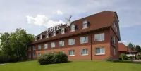 Hotel Zur Windmühle Hotel dekat Musicalschule Ahrensburg