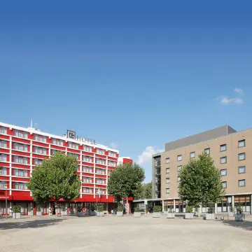 NH Maastricht Отели рядом с достопримечательностью «Коммелквартир»